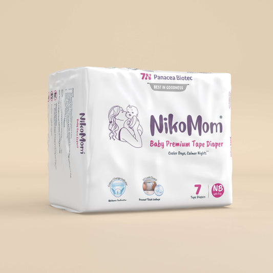 NikoMom baby premium tape diaper package on a beige background