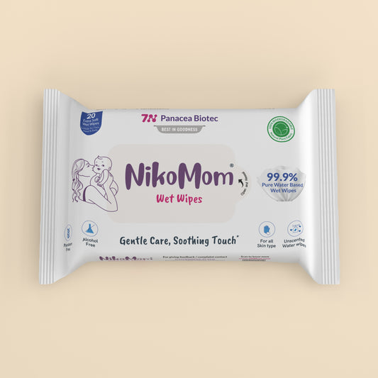 NikoMom wet wipes packaging on a beige background